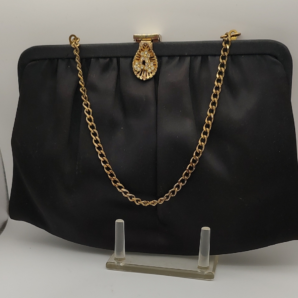 Sophisticated Black and Gold Clutch with Chain